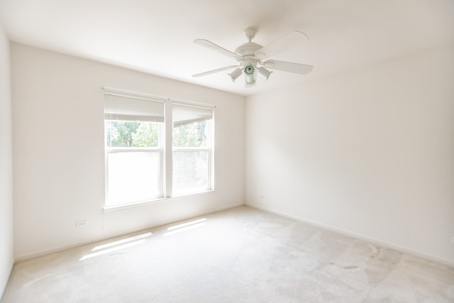 24625 Woodstock Dr, Plainfield, IL 60585 - empty room featuring light carpet and a ceiling fan