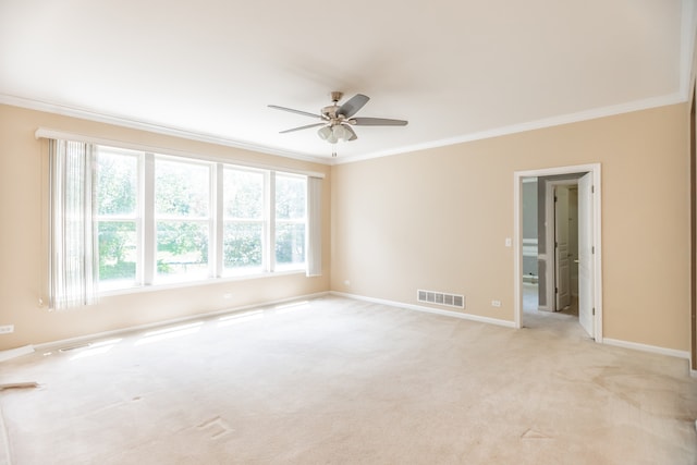 24625 Woodstock Dr, Plainfield, IL 60585 - unfurnished room featuring crown molding, ceiling fan, and light carpet