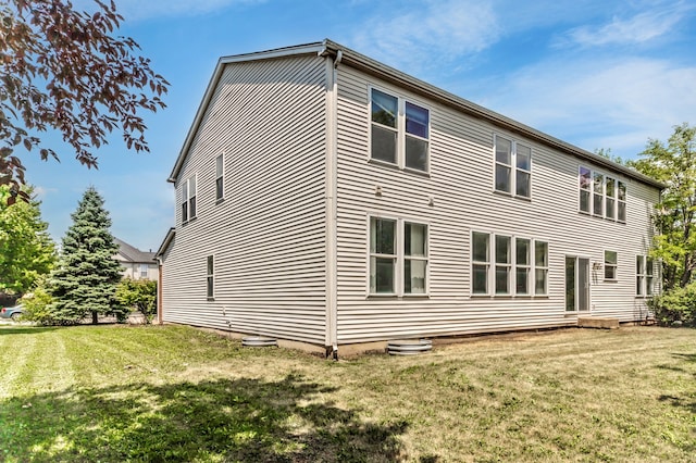 24625 Woodstock Dr, Plainfield, IL 60585 - back of property featuring a yard