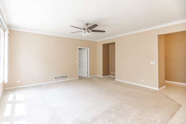 24625 Woodstock Dr, Plainfield, IL 60585 - empty room with a ceiling fan, ornamental molding, and light carpet