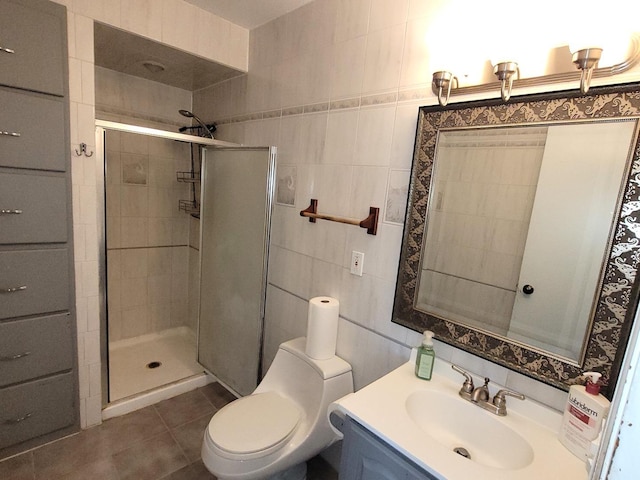 19936 S Spruce Dr, Frankfort, IL 60423 - bathroom featuring a stall shower, vanity, and tile patterned floors