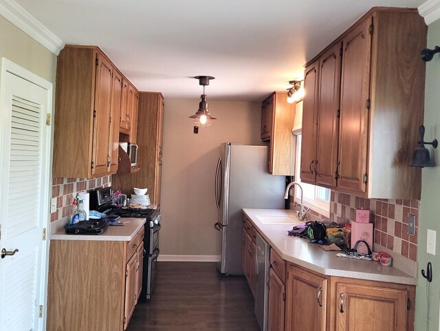 19936 S Spruce Dr, Frankfort, IL 60423 - kitchen featuring appliances with stainless steel finishes, tasteful backsplash, dark wood-style floors, and light countertops