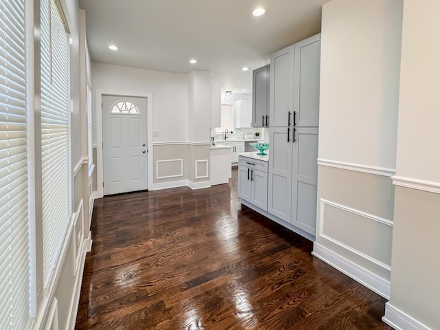 7755 S Wolcott Ave, Chicago, IL 60620 - entrance foyer with a decorative wall, dark wood-style flooring, a wainscoted wall, and recessed lighting