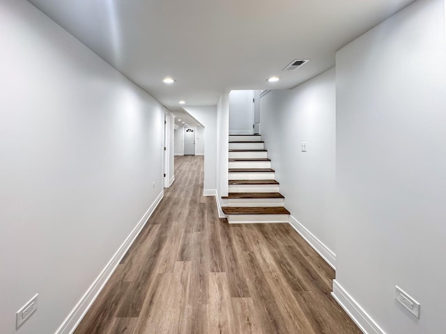 7755 S Wolcott Ave, Chicago, IL 60620 - hallway featuring stairway, dark wood-type flooring, and recessed lighting