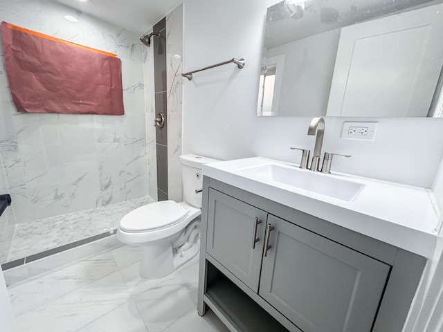7755 S Wolcott Ave, Chicago, IL 60620 - full bathroom featuring marble look tile flooring, vanity, and a marble finish shower