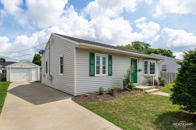 120 Riverside Dr, Montgomery, IL 60538 - view of front of property featuring an outbuilding, a garage, and driveway