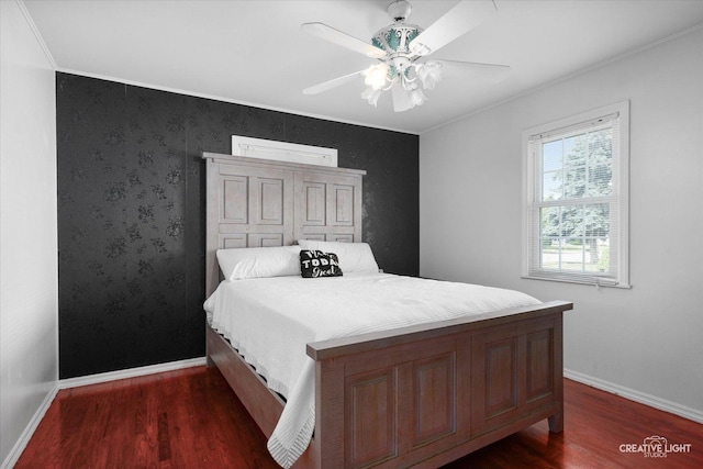 120 Riverside Dr, Montgomery, IL 60538 - bedroom with dark wood-style flooring, ornamental molding, and a ceiling fan