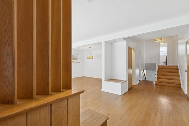 9007 Forestview Rd, Evanston, IL 60203 - hallway with light wood-style floors and baseboards