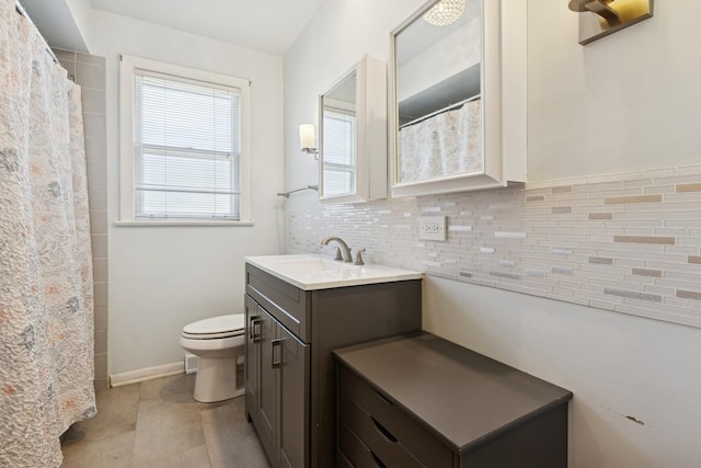 9007 Forestview Rd, Evanston, IL 60203 - bathroom with vanity, tile patterned flooring, decorative backsplash, and curtained shower