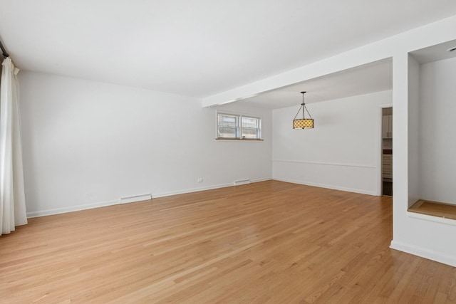 9007 Forestview Rd, Evanston, IL 60203 - empty room with light wood-style floors and baseboards