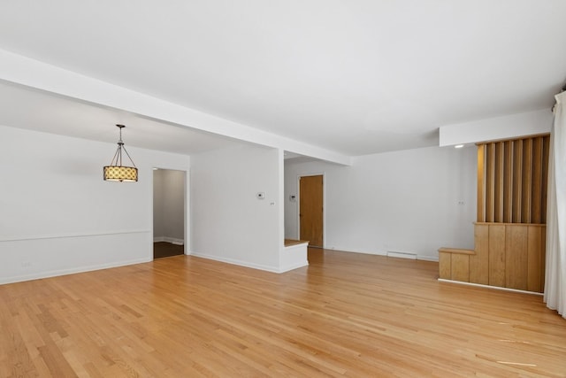 9007 Forestview Rd, Evanston, IL 60203 - unfurnished room with light wood-type flooring and baseboards
