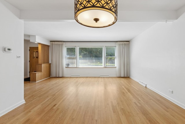 9007 Forestview Rd, Evanston, IL 60203 - spare room with wood finished floors and baseboards