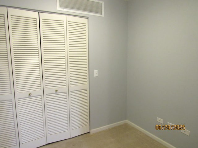 390 W Mahogany Ct Unit 610, Palatine, IL 60067 - detailed view of carpet floors and baseboards