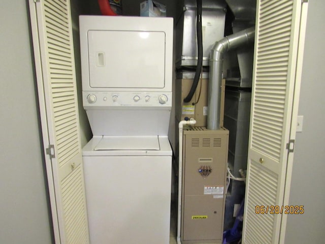 390 W Mahogany Ct Unit 610, Palatine, IL 60067 - laundry room with stacked washer and clothes dryer