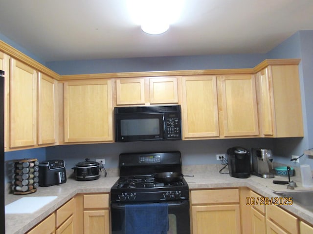 390 W Mahogany Ct Unit 610, Palatine, IL 60067 - kitchen featuring black appliances, light brown cabinets, and light countertops