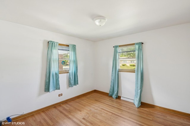 901 S Can Dota Ave, Mount Prospect, IL 60056 - unfurnished room featuring plenty of natural light and light wood-type flooring