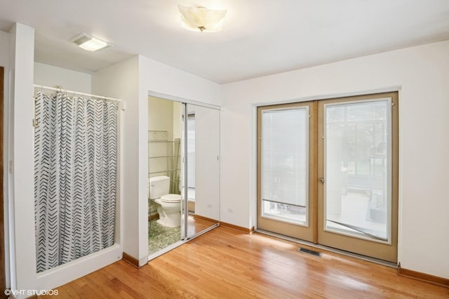 901 S Can Dota Ave, Mount Prospect, IL 60056 - bathroom with wood finished floors and a shower with shower curtain