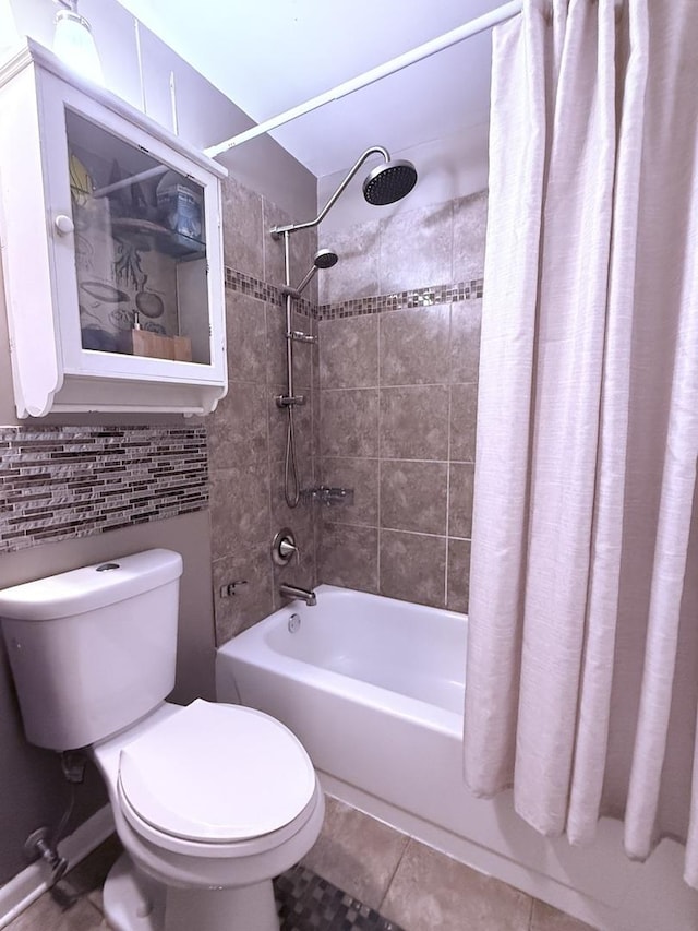 3660 N Lake Shore Dr Unit 1309, Chicago, IL 60613 - bathroom featuring shower / bath combo with shower curtain and tile patterned flooring