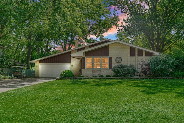 13007 S Oak Park Ave, Palos Heights, IL 60463 - mid-century modern home with brick siding, a chimney, concrete driveway, and a garage
