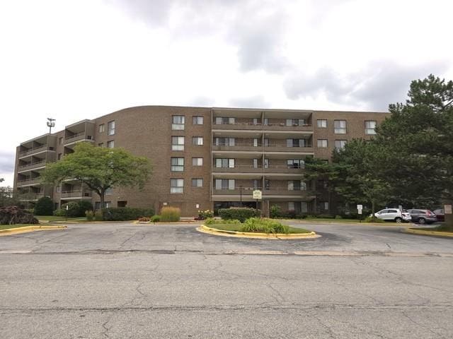 7 E Carriageway Dr Unit 110, Hazel Crest, IL 60429 - view of apartment building / complex with uncovered parking
