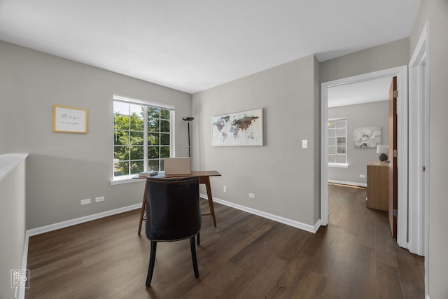 2416 Oakfield Dr Unit 2416, Aurora, IL 60503 - home office featuring dark wood-style floors and baseboards