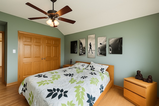 1102 Brian Dr, Manteno, IL 60950 - bedroom with wood finished floors, a closet, lofted ceiling, and a ceiling fan