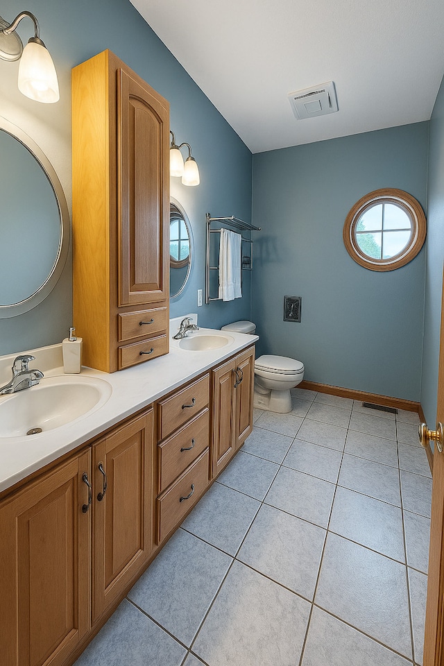 1102 Brian Dr, Manteno, IL 60950 - bathroom with double vanity and tile patterned floors