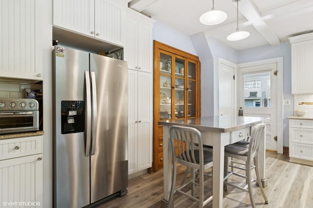 300 W Fremont St, Arlington Heights, IL 60004 - kitchen featuring stainless steel fridge with ice dispenser, light wood-style floors, backsplash, white cabinetry, and beam ceiling