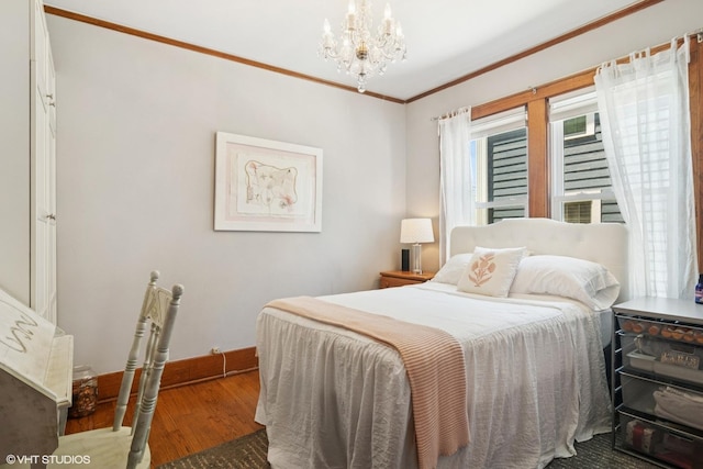 300 W Fremont St, Arlington Heights, IL 60004 - bedroom featuring wood finished floors, a chandelier, and crown molding