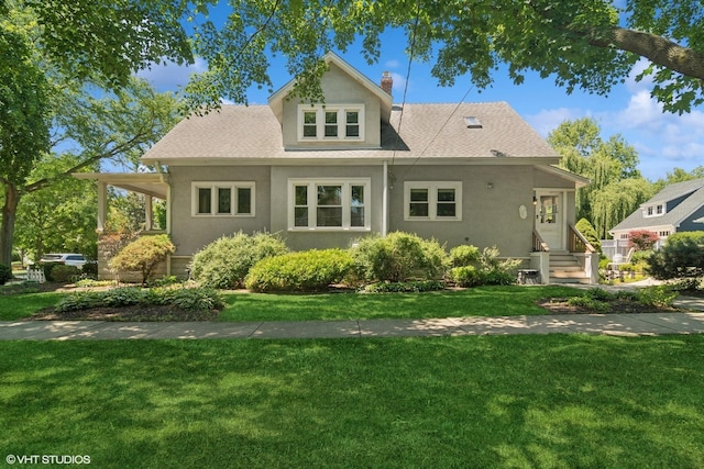 300 W Fremont St, Arlington Heights, IL 60004 - back of property featuring stucco siding, a yard, and a chimney