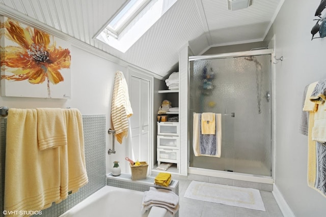 300 W Fremont St, Arlington Heights, IL 60004 - bathroom with a skylight, a shower stall, tile patterned flooring, a bath, and vaulted ceiling
