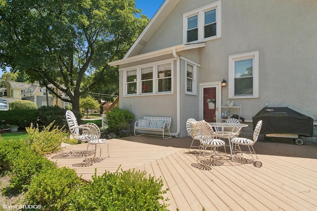 300 W Fremont St, Arlington Heights, IL 60004 - wooden deck with a grill and outdoor dining area