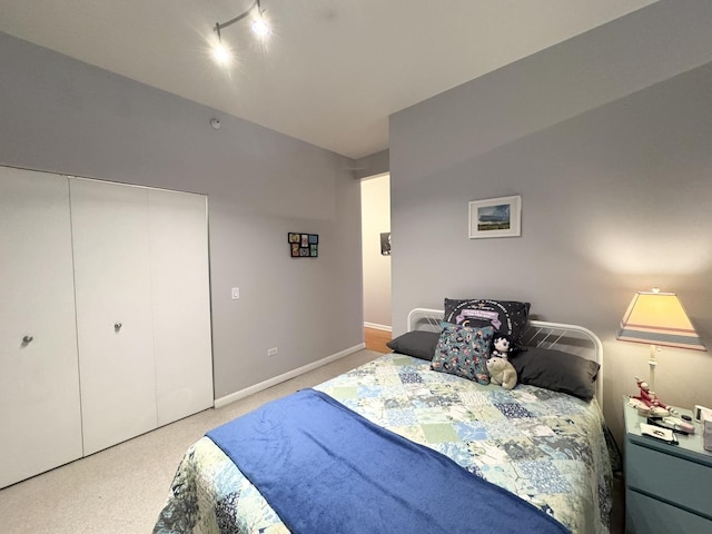 1200 W Monroe St Unit 516, Chicago, IL 60607 - bedroom with carpet, track lighting, and a closet