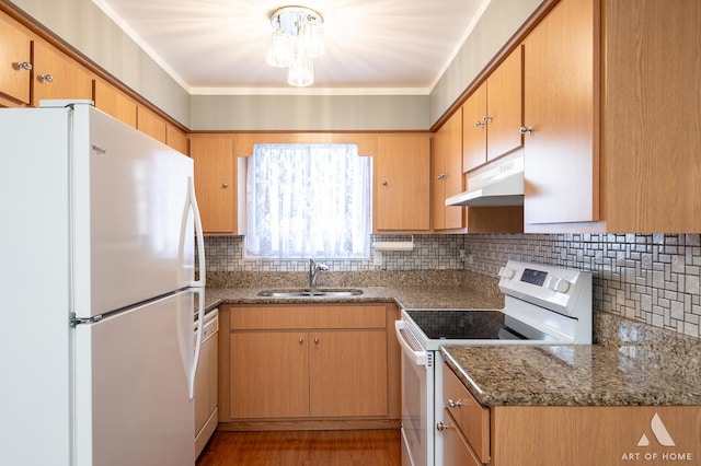 8049 Beloit Ave Unit 2C, Bridgeview, IL 60455 - kitchen featuring white appliances, under cabinet range hood, backsplash, a chandelier, and dark stone counters