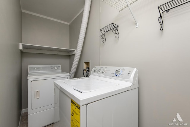 8049 Beloit Ave Unit 2C, Bridgeview, IL 60455 - laundry area with washer and clothes dryer and ornamental molding