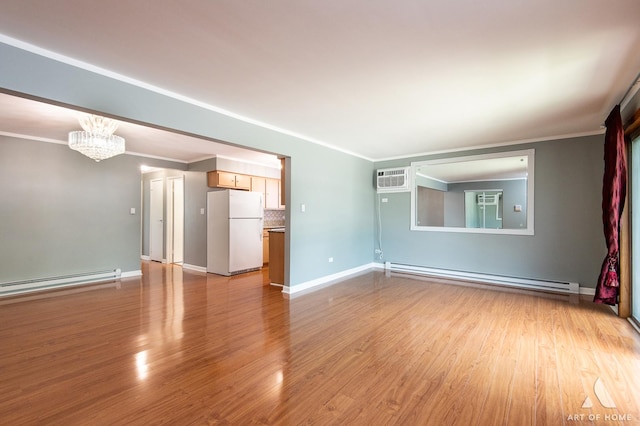 8049 Beloit Ave Unit 2C, Bridgeview, IL 60455 - unfurnished living room with a baseboard heating unit, a chandelier, light wood finished floors, a wall mounted AC, and ornamental molding
