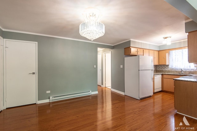 8049 Beloit Ave Unit 2C, Bridgeview, IL 60455 - kitchen with white appliances, a baseboard radiator, crown molding, dark countertops, and wood finished floors