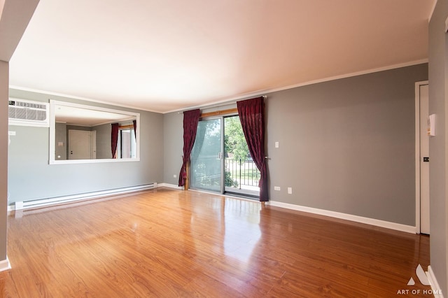 8049 Beloit Ave Unit 2C, Bridgeview, IL 60455 - spare room featuring a baseboard heating unit, wood finished floors, a wall mounted air conditioner, and crown molding
