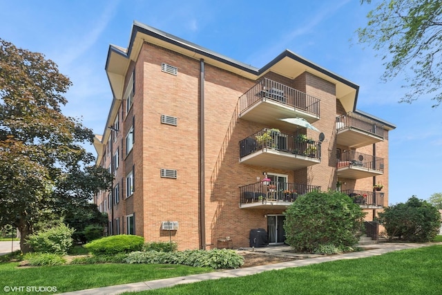 1217 S Old Wilke Rd Unit 101, Arlington Heights, IL 60005 - view of apartment building / complex