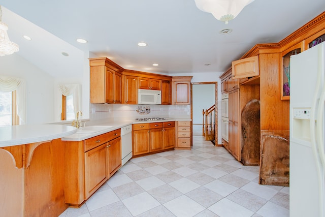 535 Weidner Rd, Buffalo Grove, IL 60089 - kitchen with white appliances, light countertops, recessed lighting, a peninsula, and backsplash