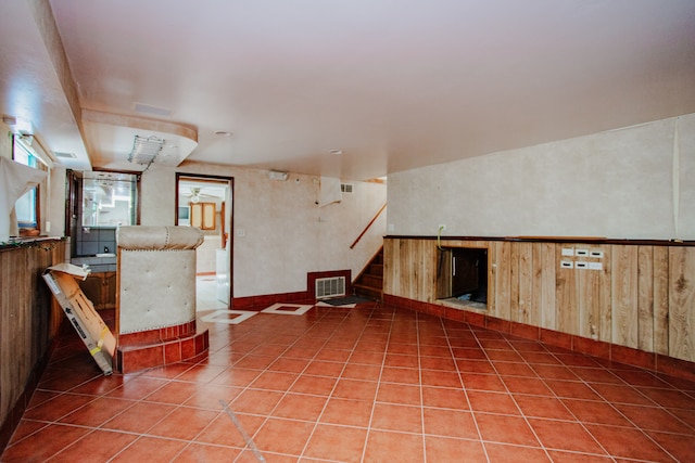 535 Weidner Rd, Buffalo Grove, IL 60089 - below grade area featuring stairs, tile patterned floors, and wood walls