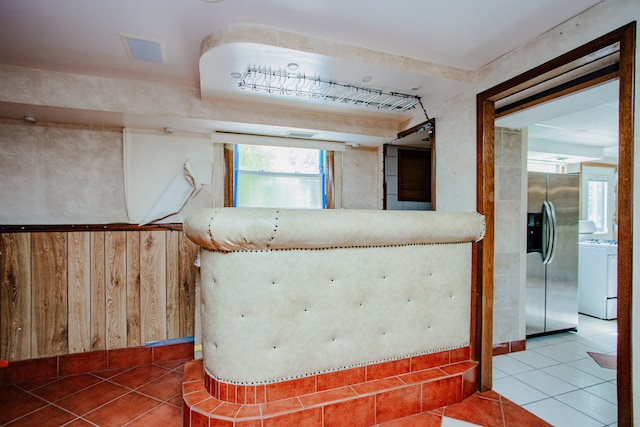 535 Weidner Rd, Buffalo Grove, IL 60089 - interior space featuring stainless steel refrigerator with ice dispenser, tile patterned flooring, and washer / clothes dryer