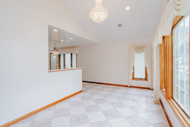 535 Weidner Rd, Buffalo Grove, IL 60089 - spare room featuring lofted ceiling, a chandelier, and recessed lighting