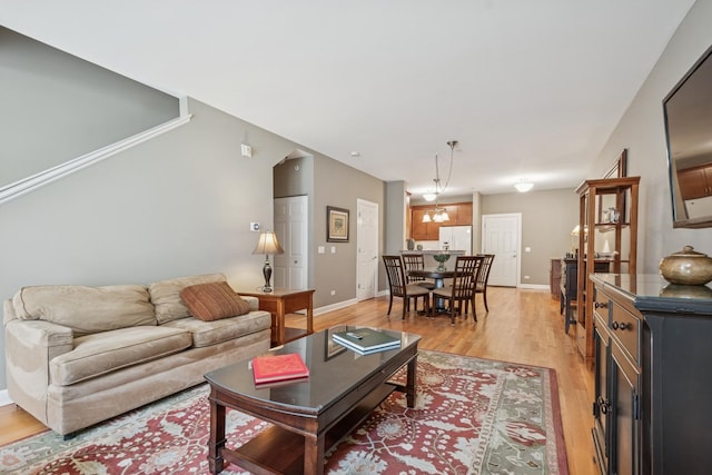 8457 Callie Ave, Morton Grove, IL 60053 - living area featuring light wood-style flooring and baseboards