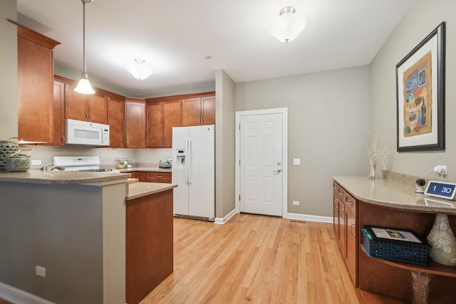 8457 Callie Ave, Morton Grove, IL 60053 - kitchen with white appliances, light wood-style flooring, light stone counters, hanging light fixtures, and brown cabinetry