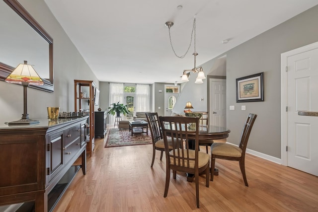 8457 Callie Ave, Morton Grove, IL 60053 - dining room featuring light wood-style floors and baseboards
