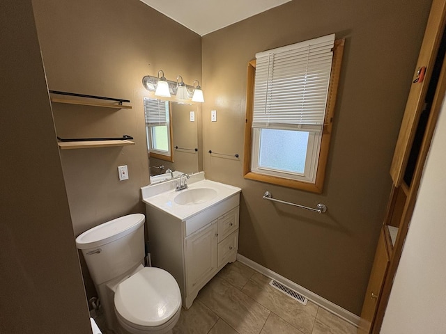 126 N Randolph St, Princeton, IL 61356 - bathroom with vanity and toilet