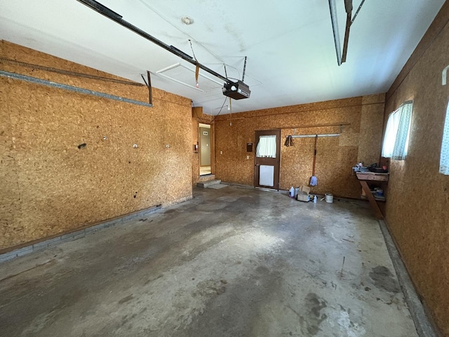 126 N Randolph St, Princeton, IL 61356 - garage featuring electric panel and a garage door opener
