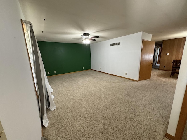 126 N Randolph St, Princeton, IL 61356 - unfurnished room featuring a ceiling fan and light colored carpet