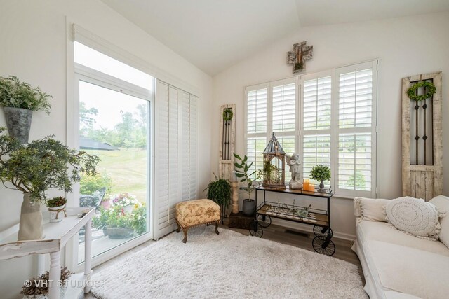 321 Mahogany Dr, Algonquin, IL 60102 - sitting room featuring lofted ceiling, healthy amount of natural light, and wood finished floors